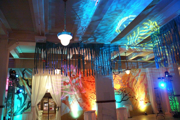 Artistic venue with colorful lighting and sculptural elements
