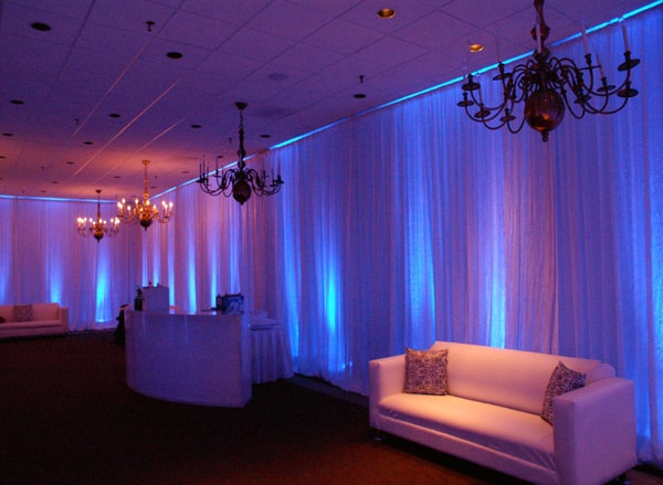 Elegant lounge with purple and blue ambient lighting